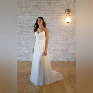 Wedding dress. New. White. Size: 8.